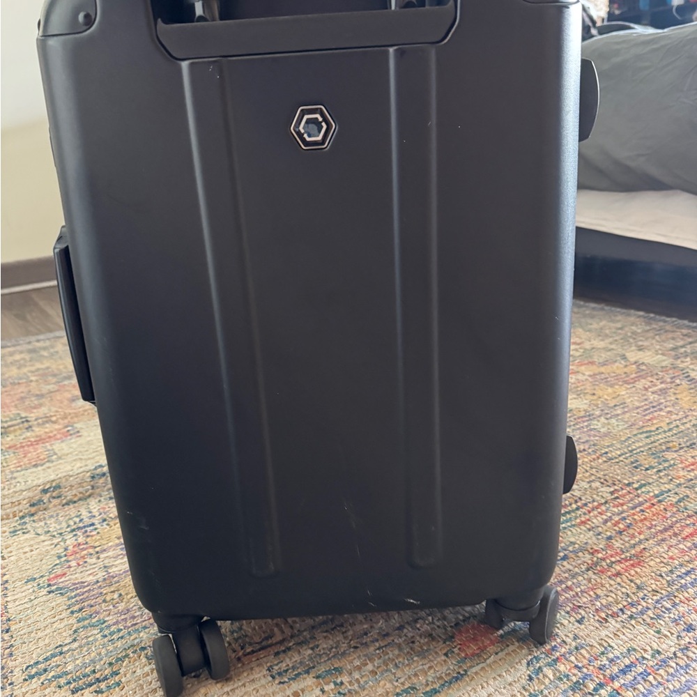 Black Hard Shell Rolling Suitcase